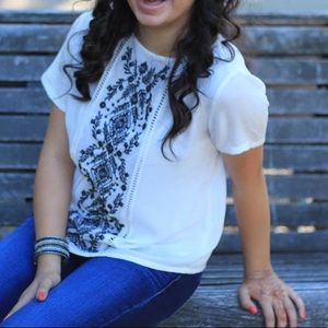 White boho style top with black embroidery